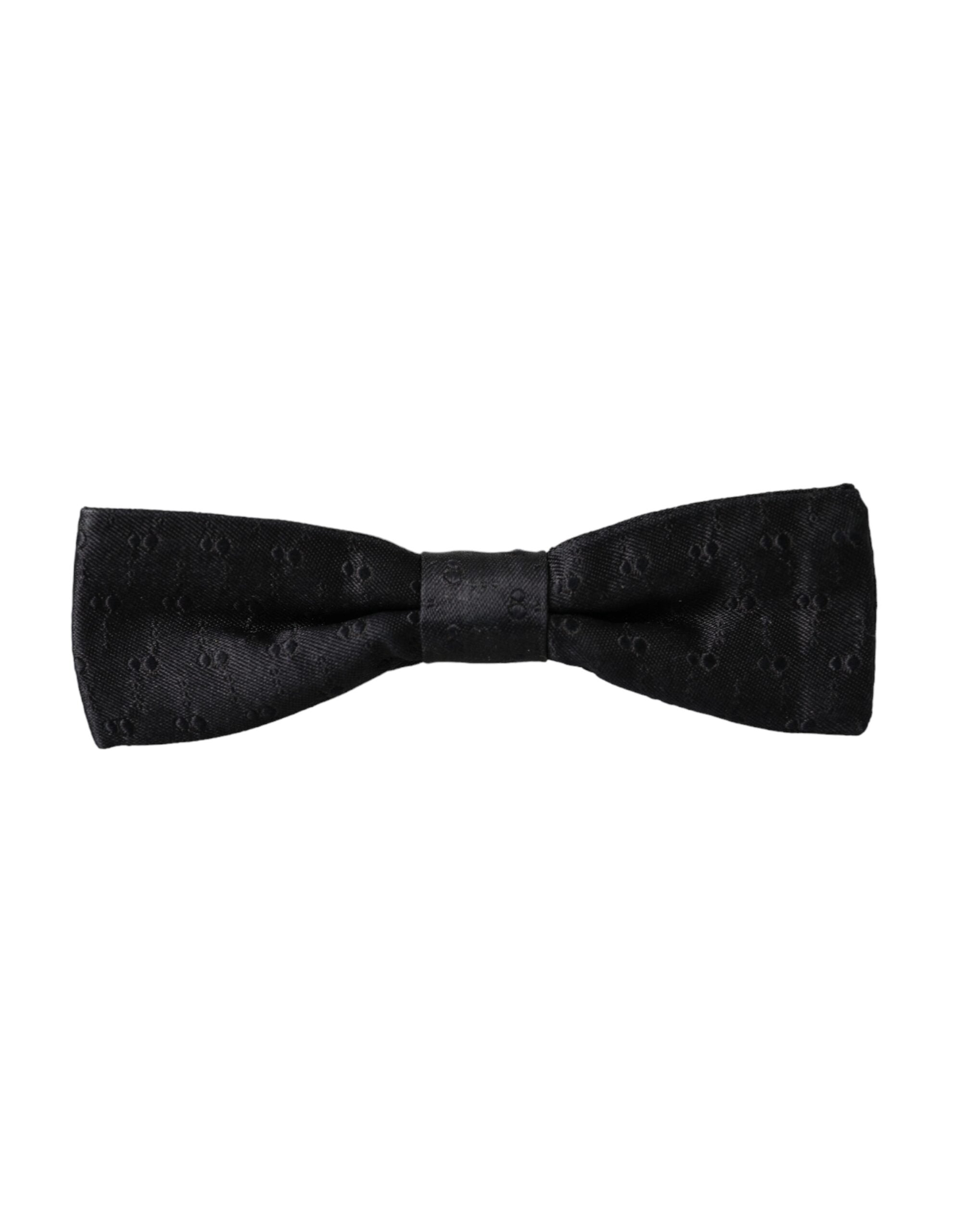 Black silk patterned adjustable men's bow tie by Dolce & Gabbana, featuring elegant design and classic style.
