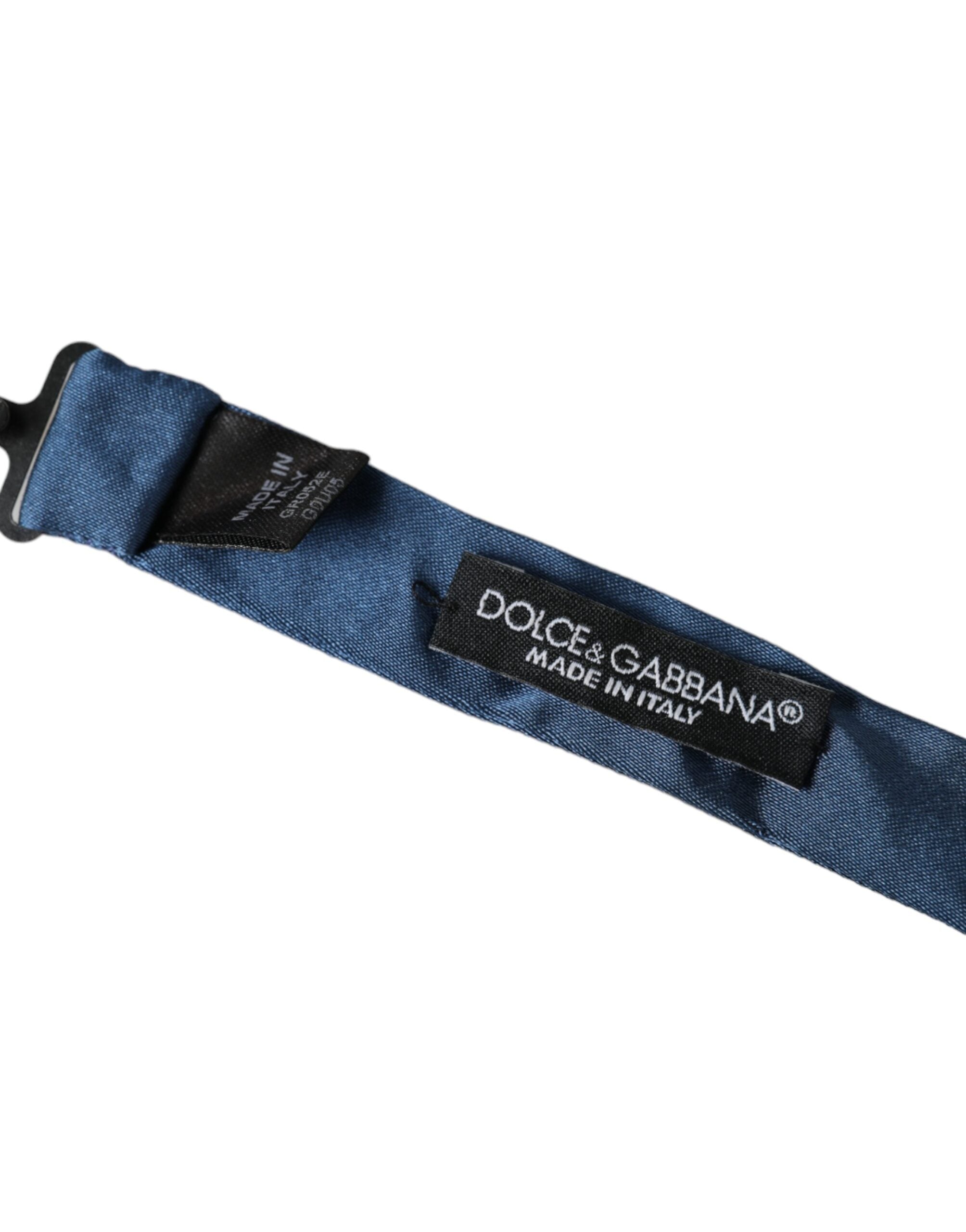 Blue satin silk men's bow tie with adjustable neck strap from Dolce & Gabbana, featuring a sleek and elegant design.