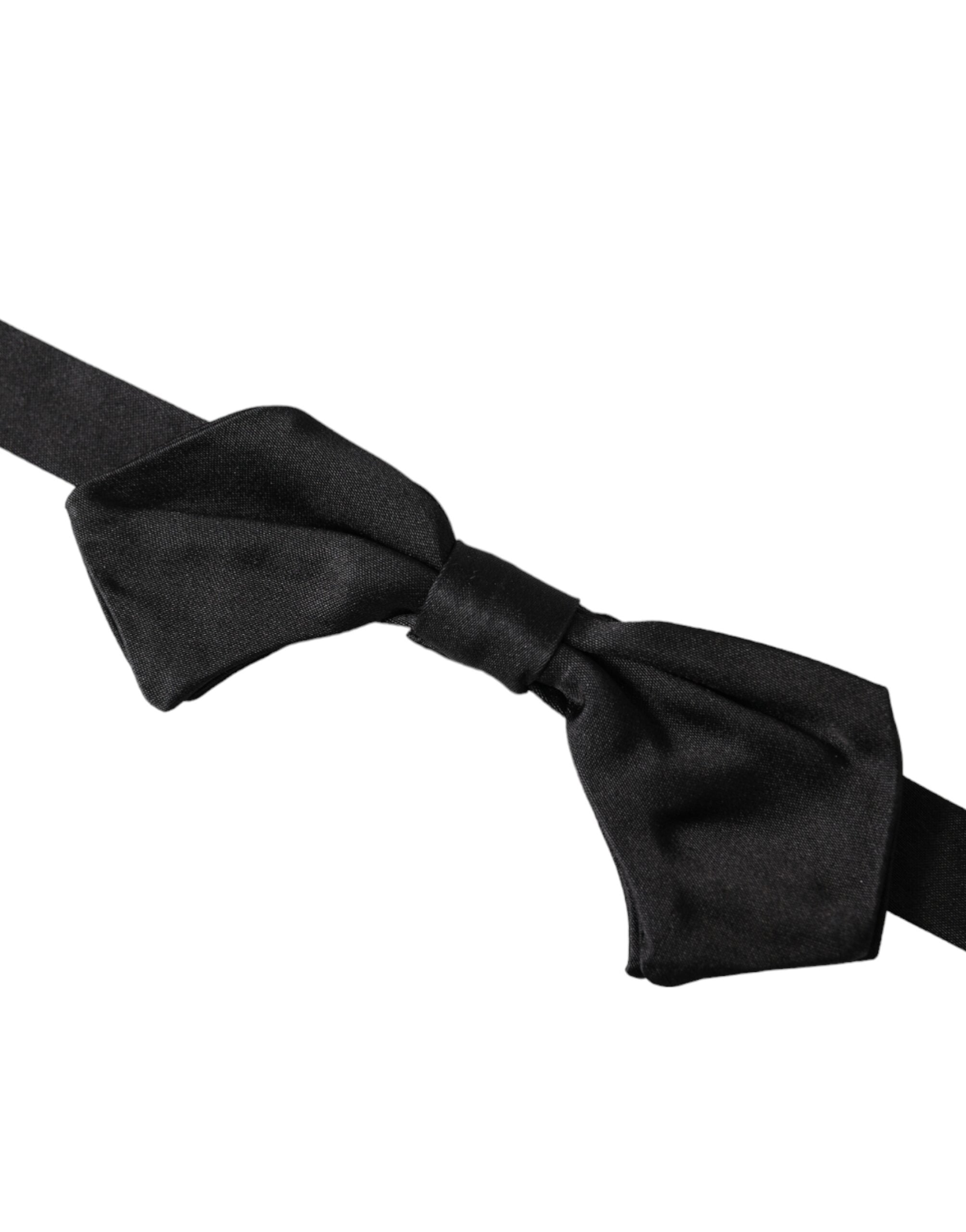 Black satin silk adjustable neck bow tie for men by Dolce & Gabbana, featuring a sleek and elegant design.