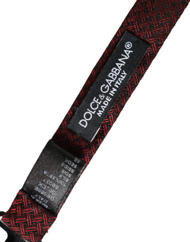 Red silk fantasy adjustable neck bow tie by Dolce & Gabbana, featuring intricate design and classic style for men's formal wear.