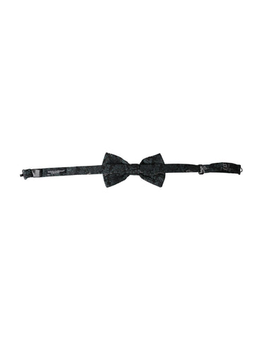 Multicolor floral silk bow tie with adjustable neck strap from Dolce & Gabbana, featuring a fantasy floral pattern.