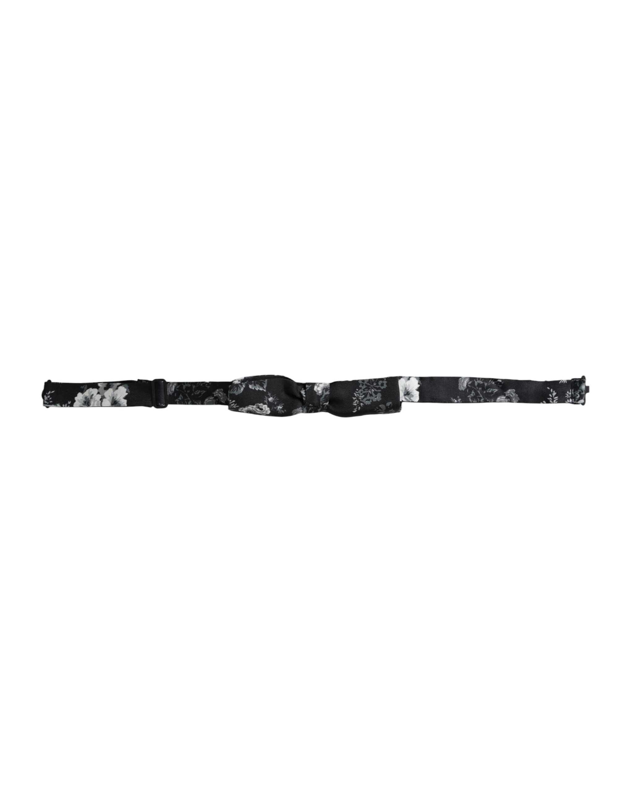 Black floral silk adjustable neck bow tie by Dolce & Gabbana, featuring a stylish floral pattern and classic design.