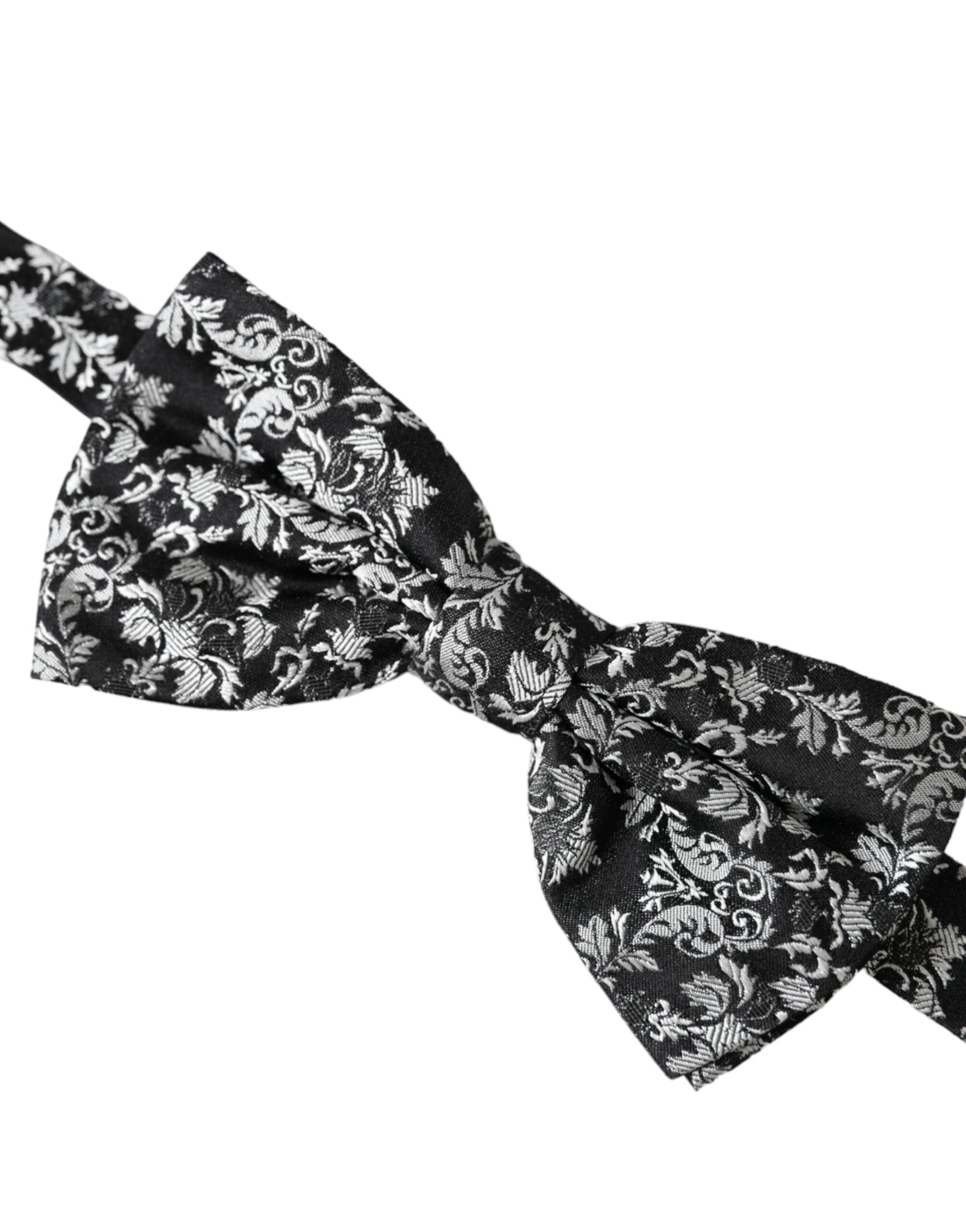 Black floral silk adjustable neck bow tie by Dolce & Gabbana, featuring a stylish floral pattern and classic design.