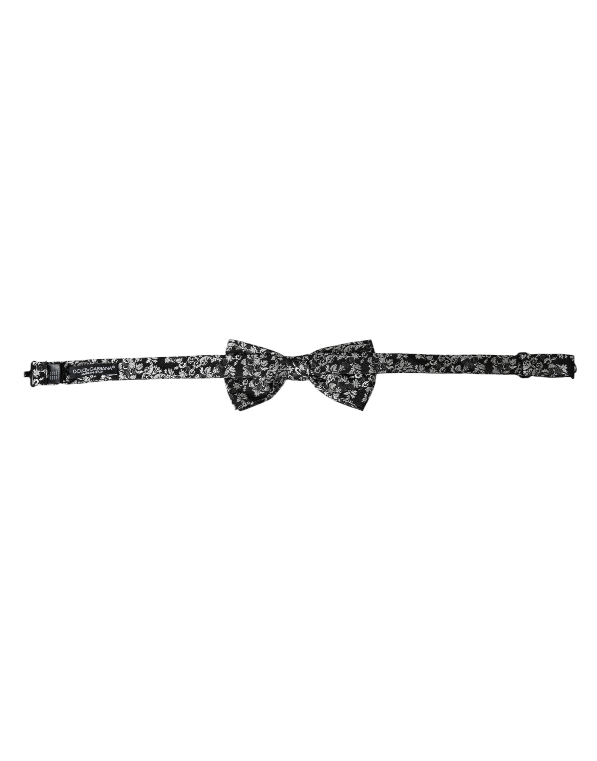 Black floral silk adjustable neck bow tie by Dolce & Gabbana, featuring a stylish floral pattern and classic design.