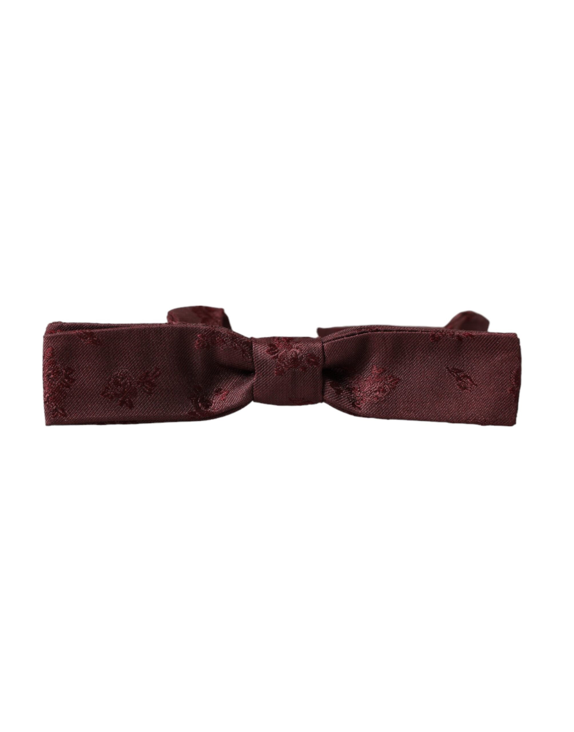 Maroon floral silk adjustable men's bow tie by Dolce & Gabbana, featuring a stylish floral pattern and elegant silk fabric.