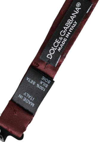 Maroon floral silk adjustable men's bow tie by Dolce & Gabbana, featuring elegant floral pattern and classic bow shape.