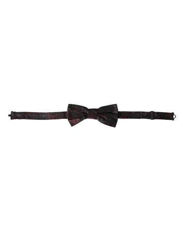 Red and black floral adjustable men's bow tie by Dolce & Gabbana, featuring a stylish floral pattern and classic bow shape.