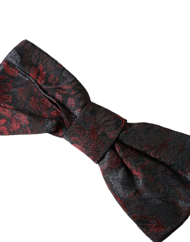 Red and black floral adjustable men's bow tie by Dolce & Gabbana, featuring a stylish floral pattern and classic knot design.