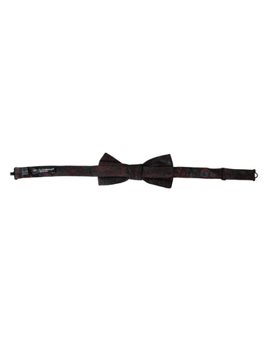 Red and black floral adjustable men's bow tie by Dolce & Gabbana, featuring a stylish floral pattern and classic bow tie shape.