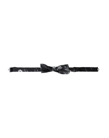 Black floral fantasy adjustable neck bow tie by Dolce & Gabbana, featuring a vibrant floral pattern and classic bow shape.