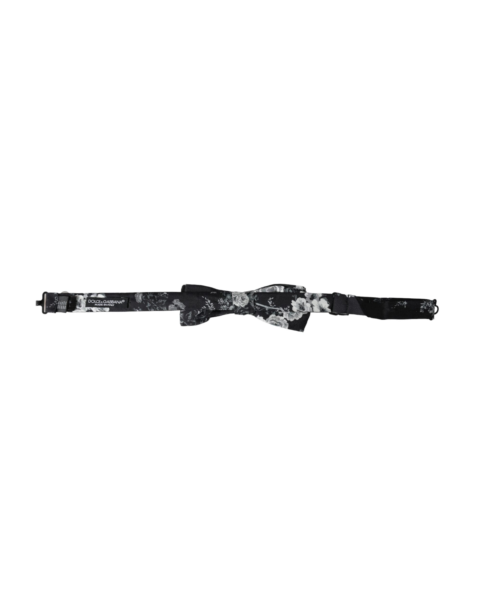 Black floral fantasy adjustable neck men's bow tie by Dolce & Gabbana featuring a stylish floral pattern and classic bow tie shape.