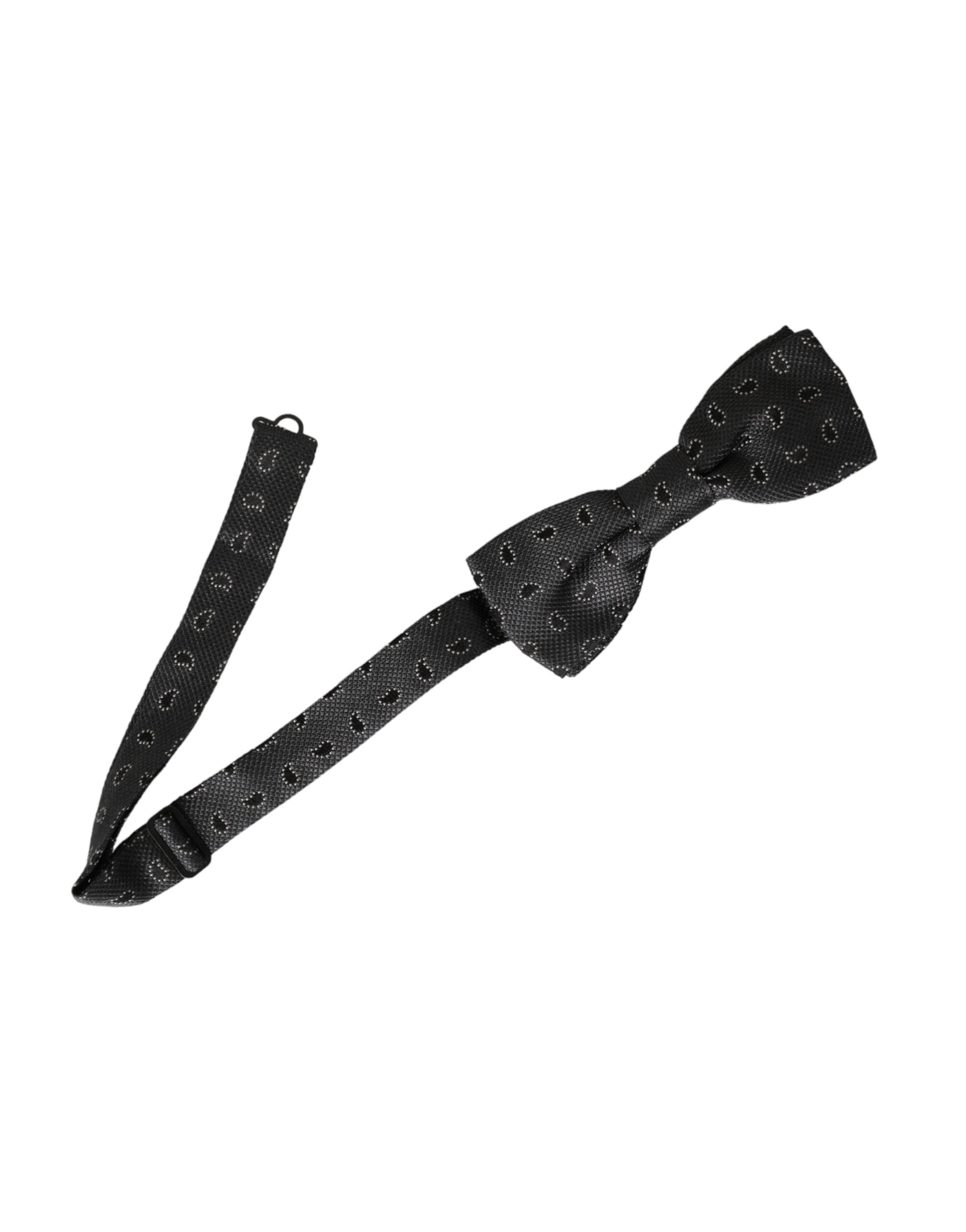 Black silk patterned adjustable men's bow tie by Dolce & Gabbana, featuring a stylish design and classic bow shape.