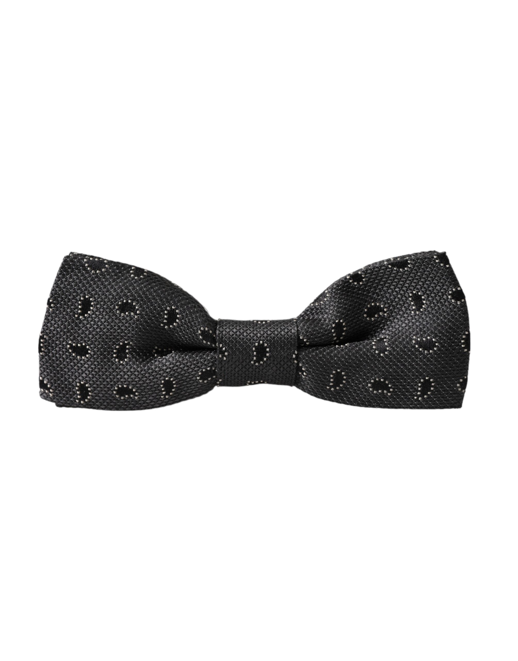 Black silk patterned adjustable men's bow tie from Dolce & Gabbana, featuring a stylish and elegant design.