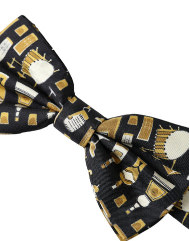 Black silk cocktail bow tie with adjustable neck strap, designed for men by Dolce & Gabbana.