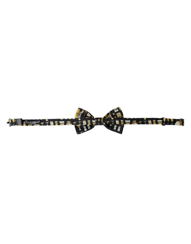 Black silk cocktail bow tie with adjustable neck strap from Dolce & Gabbana, featuring a classic, elegant design.