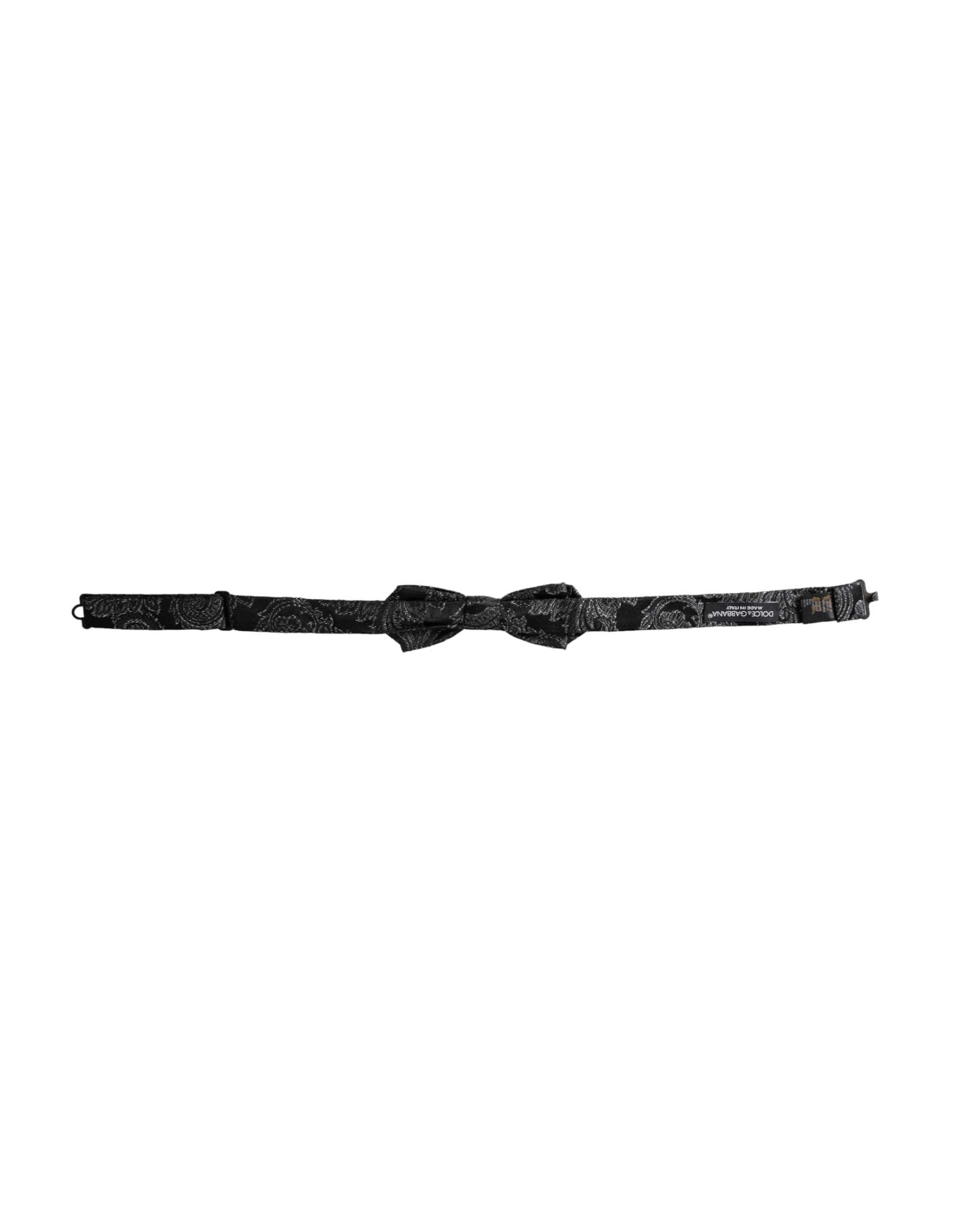 Black silk jacquard adjustable men's bow tie by Dolce & Gabbana, shown with a classic bow shape and intricate pattern.