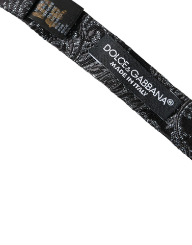 Black silk jacquard adjustable men's bow tie by Dolce & Gabbana, featuring elegant pattern and classic design.