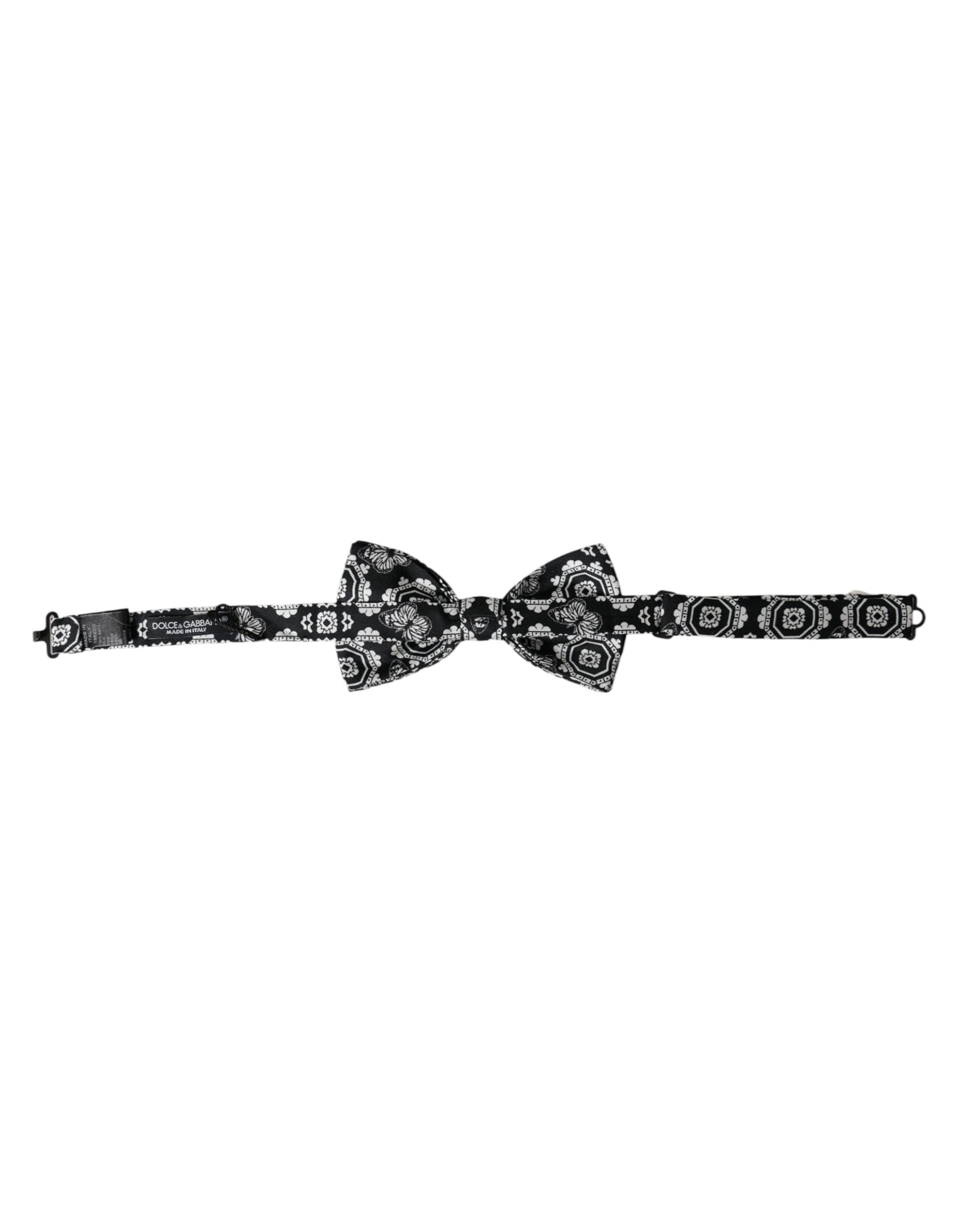 Black and white printed adjustable men's bow tie by Dolce & Gabbana, featuring a stylish pattern and classic knot design.