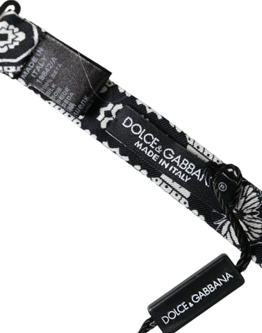 Black and white printed adjustable men's bow tie by Dolce & Gabbana, featuring a stylish pattern and classic design.