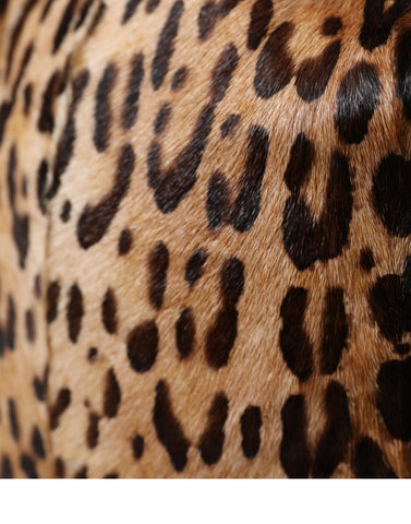 Brown leopard fur women’s bucket hat by Dolce & Gabbana, featuring a stylish leopard print and soft fur texture.