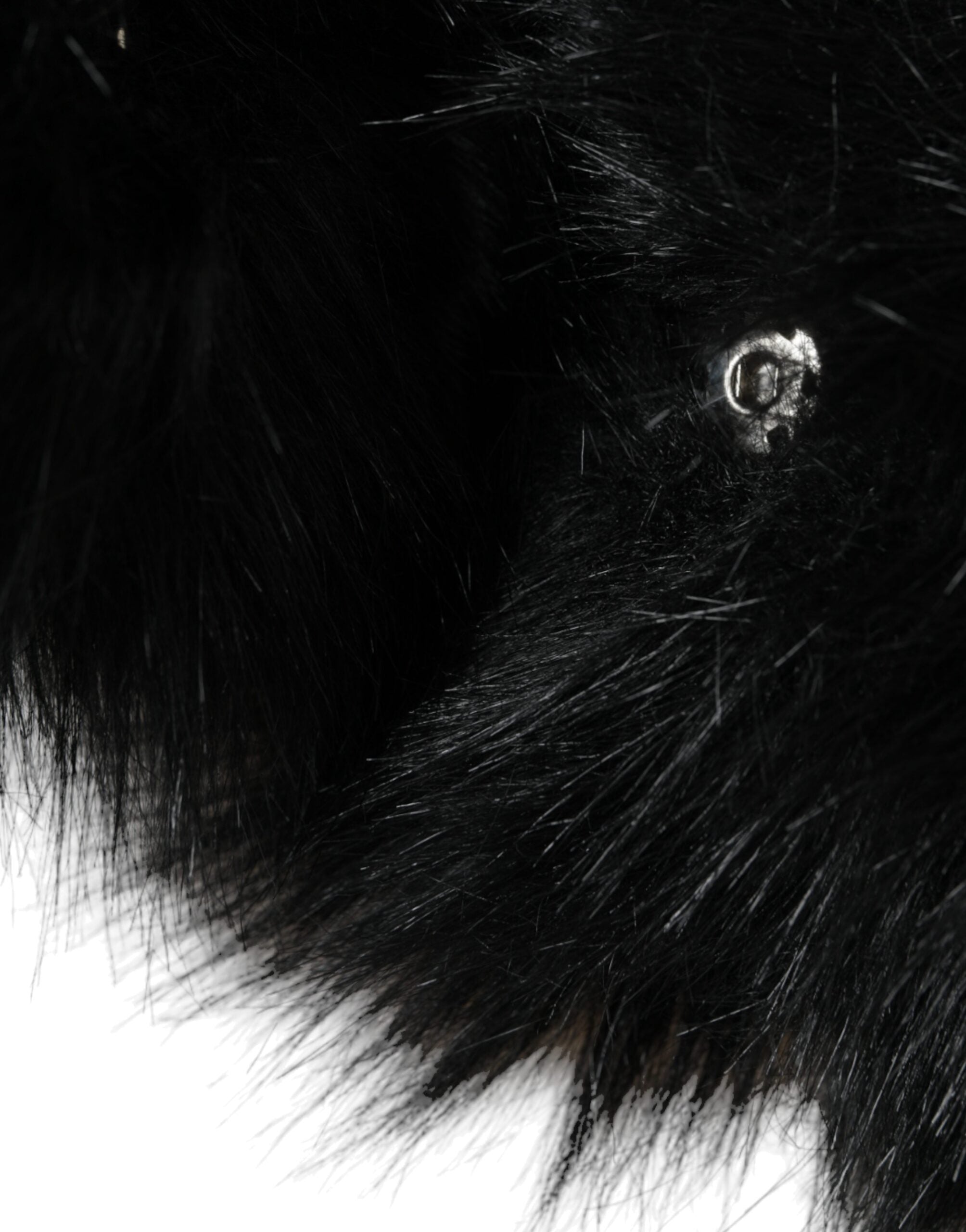 Black faux fur whole head wrap hat by Dolce & Gabbana, featuring plush, luxurious texture and full head coverage.