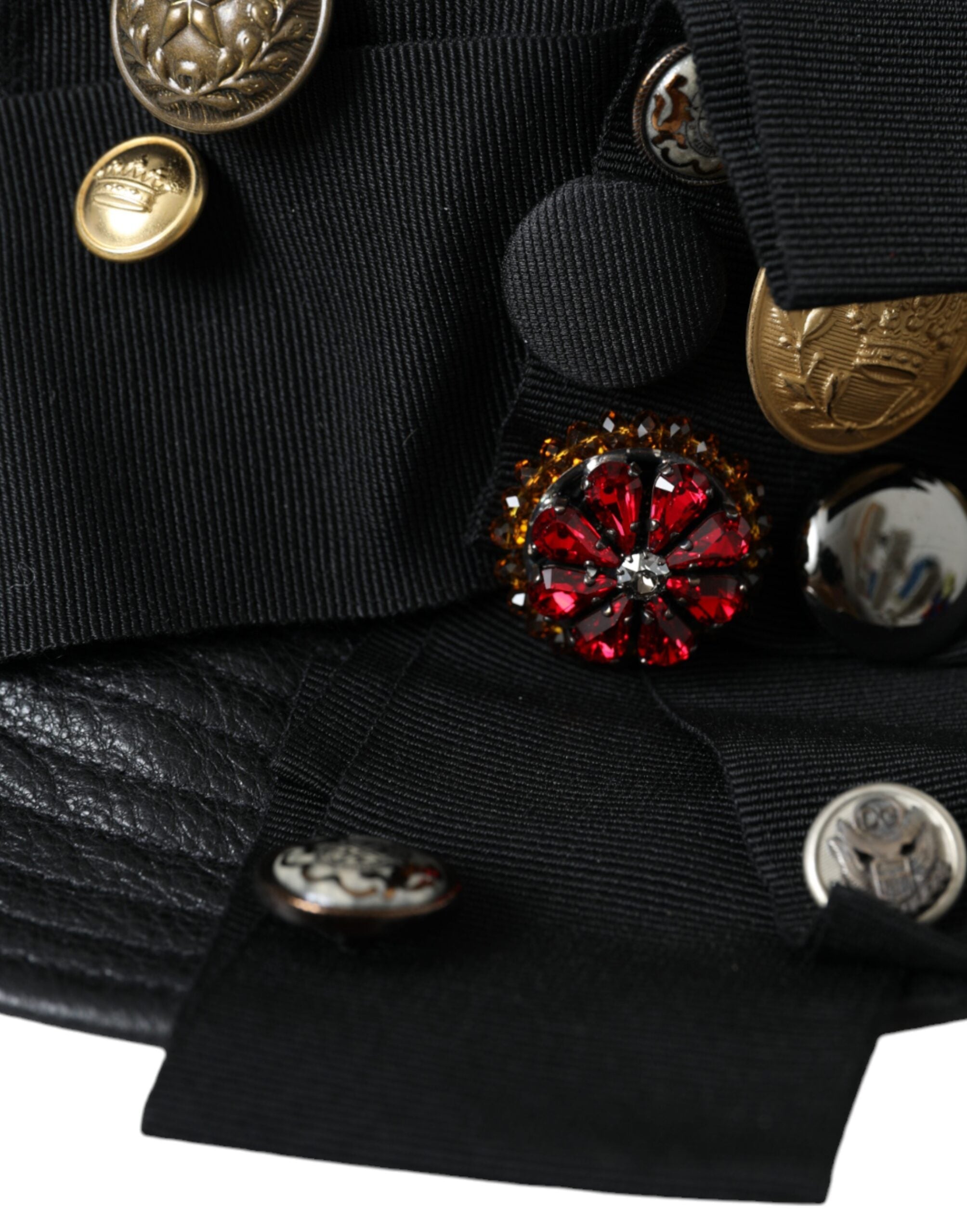 Black leather Dolce & Gabbana wide brim hat with crystal embellishments and a coin detail, stylish accessory for fashionable outfits.