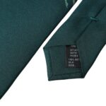 Green printed 100% silk men's tie by Dolce & Gabbana with an adjustable length and elegant design.