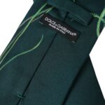Green printed 100% silk adjustable men's tie by Dolce & Gabbana, featuring a stylish floral pattern and classic design.