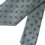 Green patterned silk men's tie by Dolce & Gabbana, featuring an adjustable design with intricate detailing.