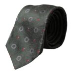 Dark gray 100% silk fantasy adjustable men's tie by Dolce & Gabbana, featuring intricate pattern and classic design.