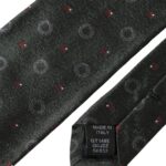 Dark gray 100% silk fantasy adjustable men's tie by Dolce & Gabbana, featuring elegant, smooth silk fabric and intricate design.