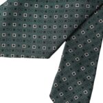 Green silk men's tie with Dolce & Gabbana logo, adjustable design, featuring a sleek and elegant style.