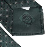 Green silk men's tie with adjustable strap and Dolce & Gabbana branded logo, featuring a stylish pattern and classic design.