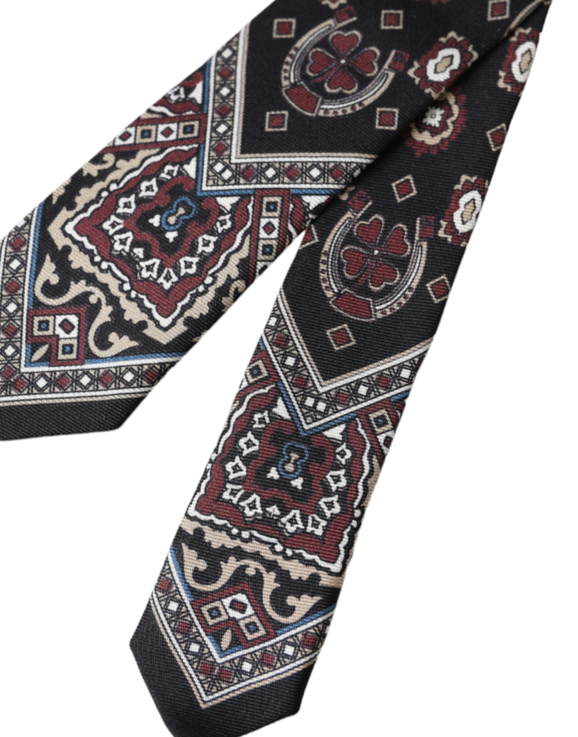 Black printed silk men's tie by Dolce & Gabbana, adjustable with a stylish pattern, ideal for formal and business wear.