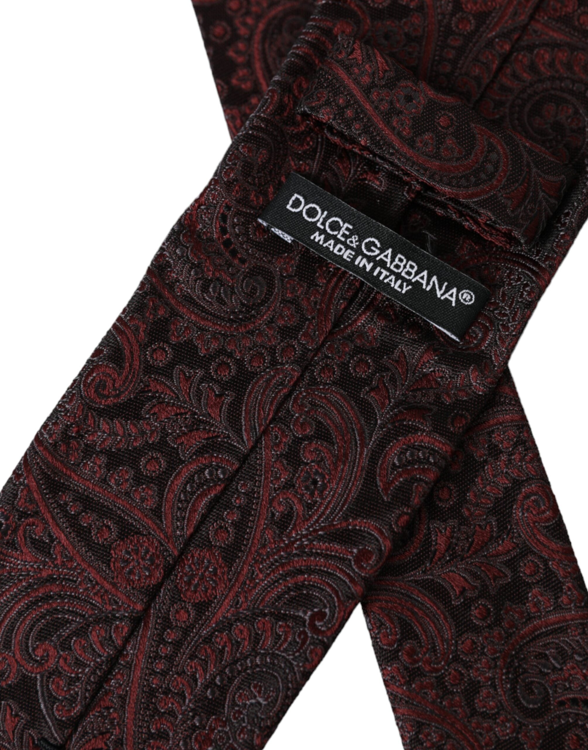 Dolce & Gabbana Bordeaux patterned silk men’s tie with adjustable length and elegant design.