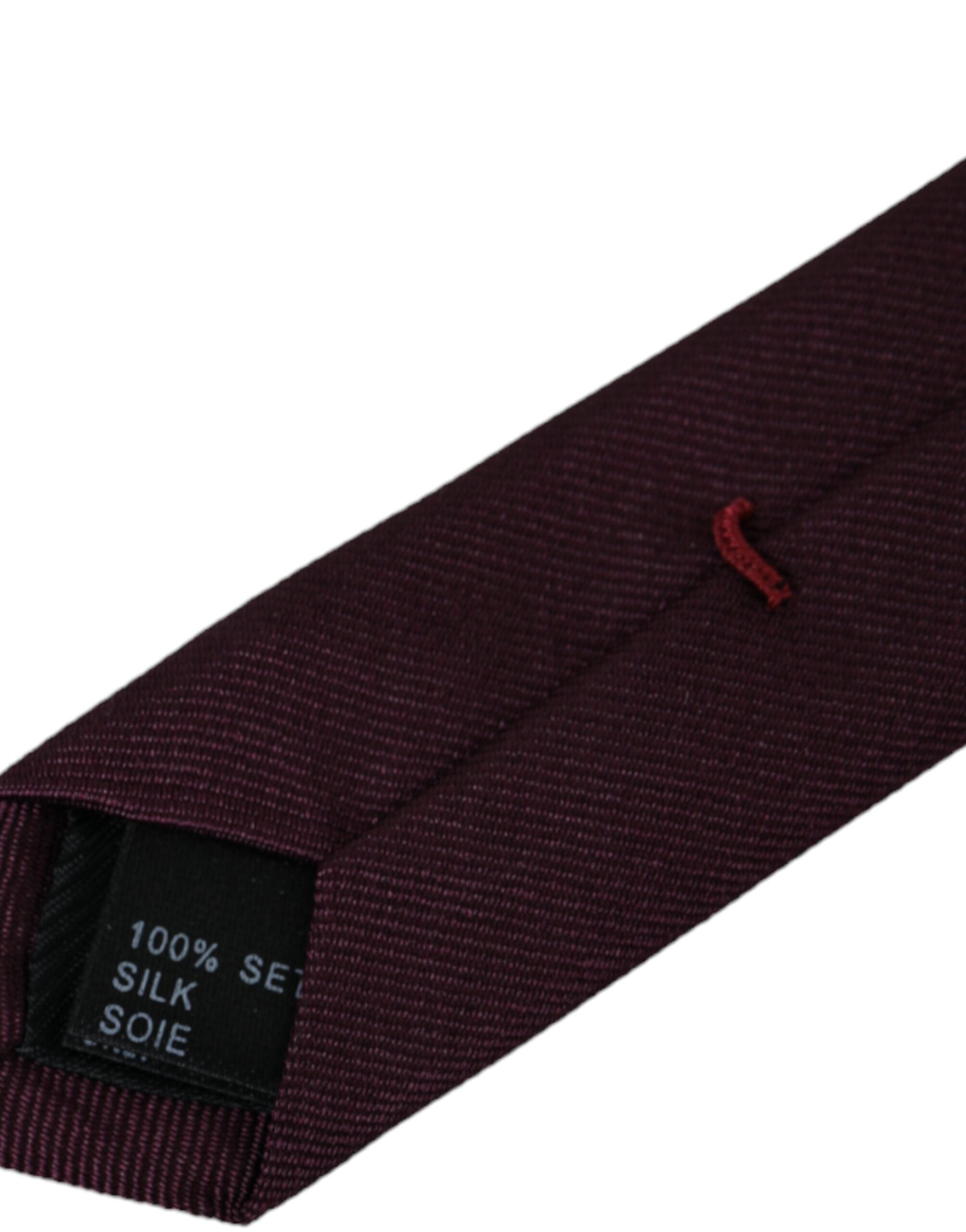 Bordeaux solid 100% silk adjustable men's tie by Dolce & Gabbana, featuring a smooth, elegant silk fabric and adjustable length.