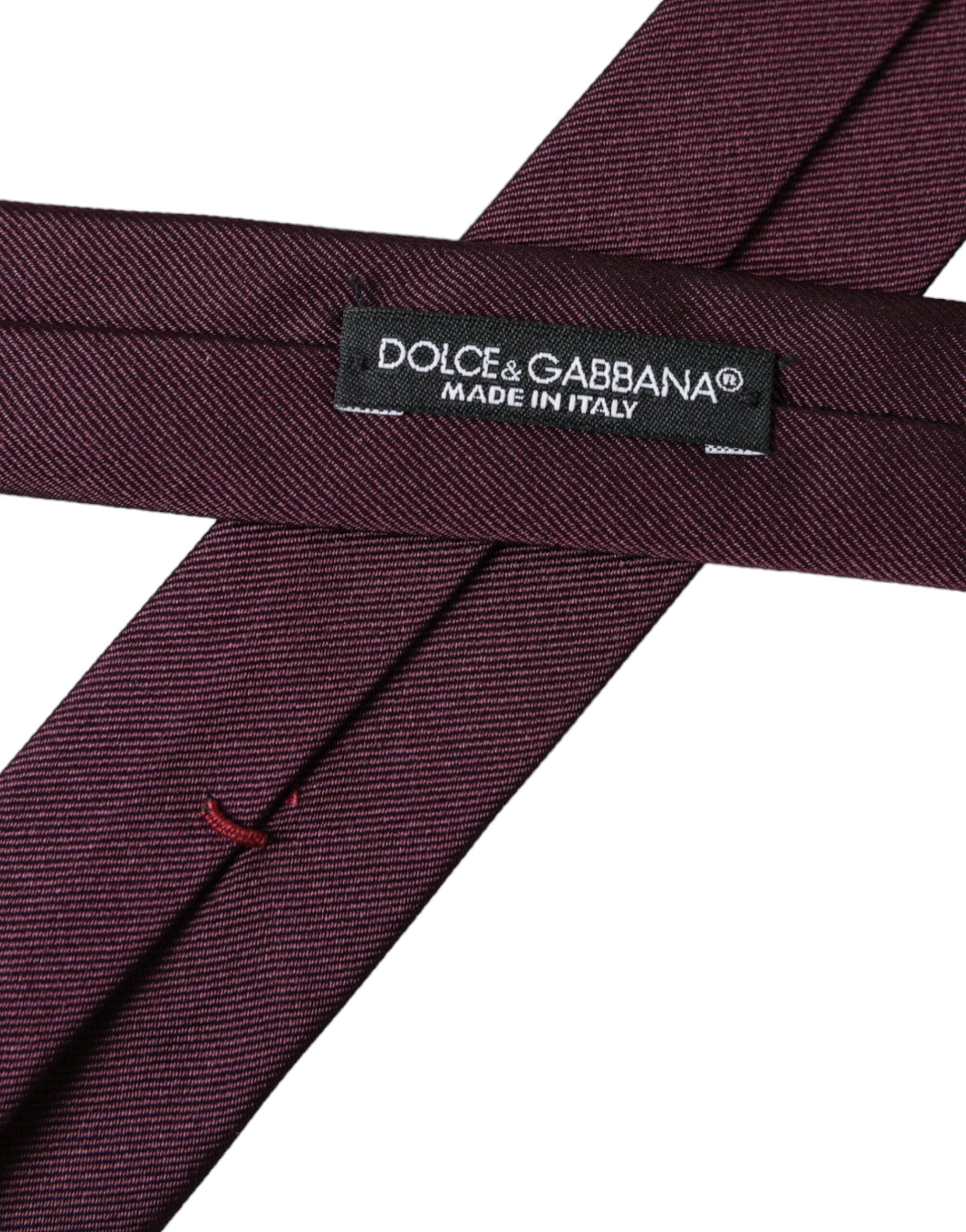 Bordeaux solid silk adjustable men's tie by Dolce & Gabbana, showcasing smooth fabric and elegant knot detail.