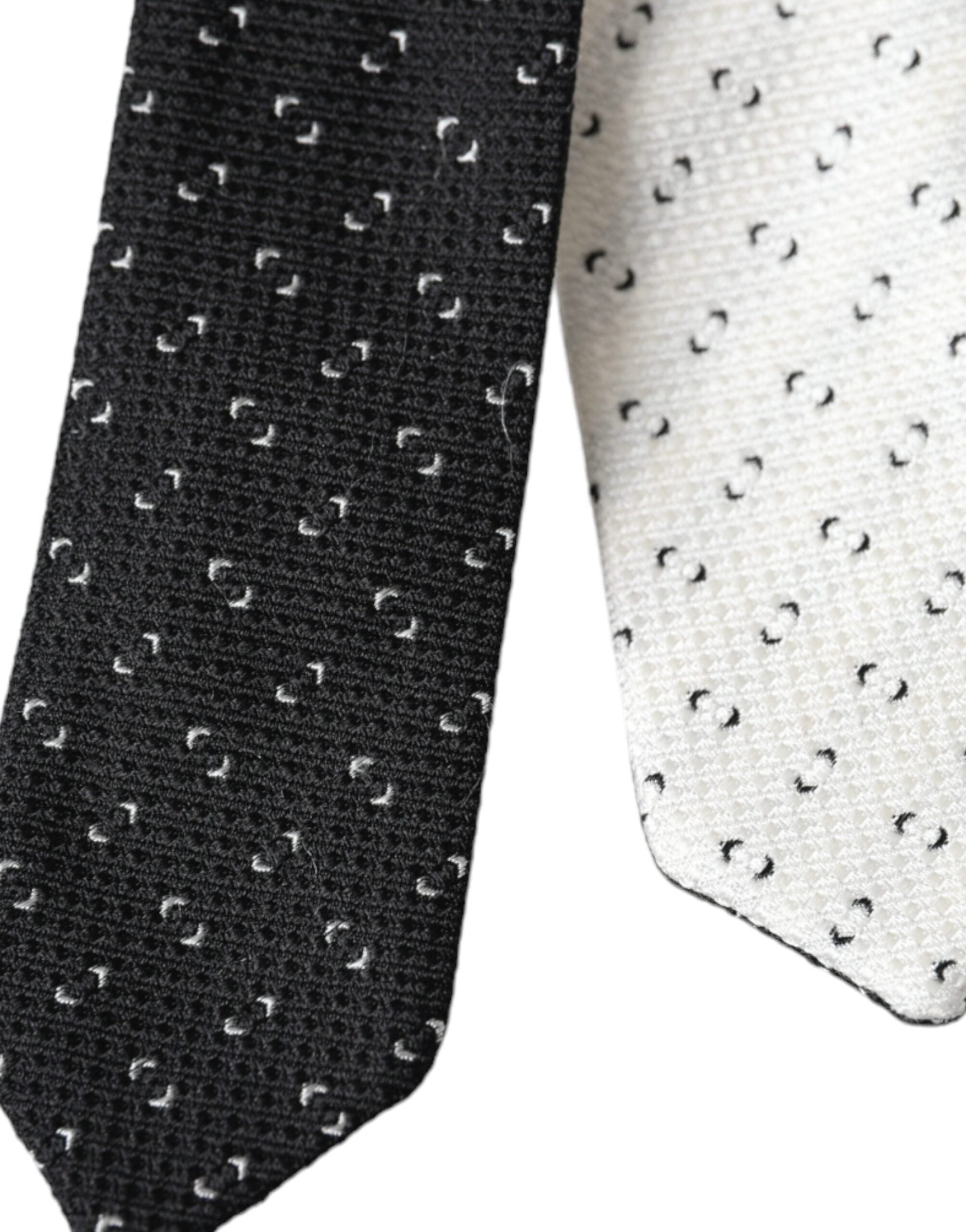 Black and white patterned adjustable tie by Dolce & Gabbana, featuring a stylish design and classic knot.