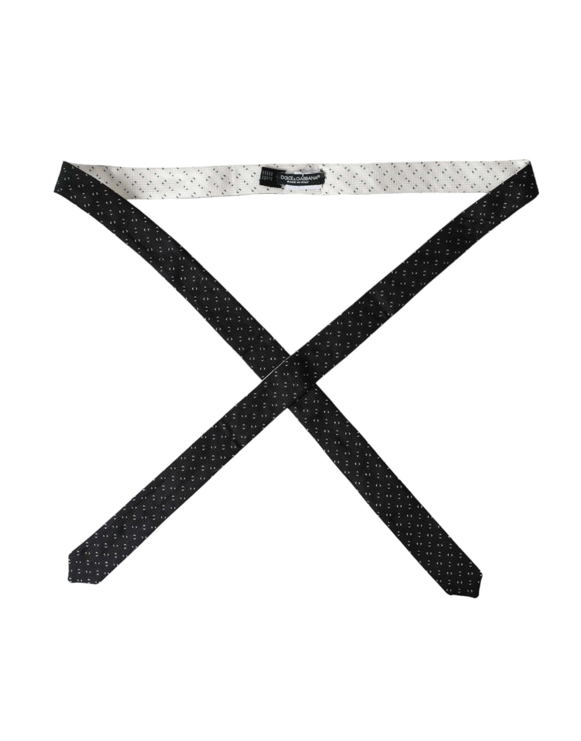 Black and white patterned adjustable tie by Dolce & Gabbana, featuring a stylish design and classic knot.