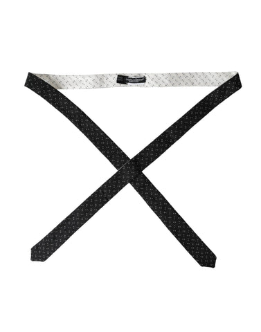 Black and white patterned adjustable tie by Dolce & Gabbana, featuring a stylish design and classic knot.