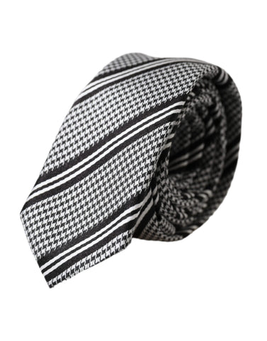 Black and white striped silk adjustable tie by Dolce & Gabbana displayed on a neutral background.