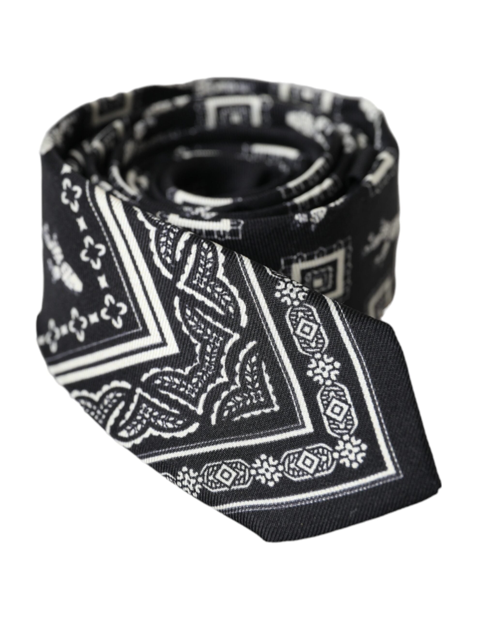 Black patterned 100% silk adjustable tie by Dolce & Gabbana, featuring a sleek design and elegant texture.