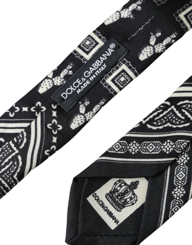 Black patterned 100% silk adjustable tie by Dolce & Gabbana, featuring a stylish design and classic knot.