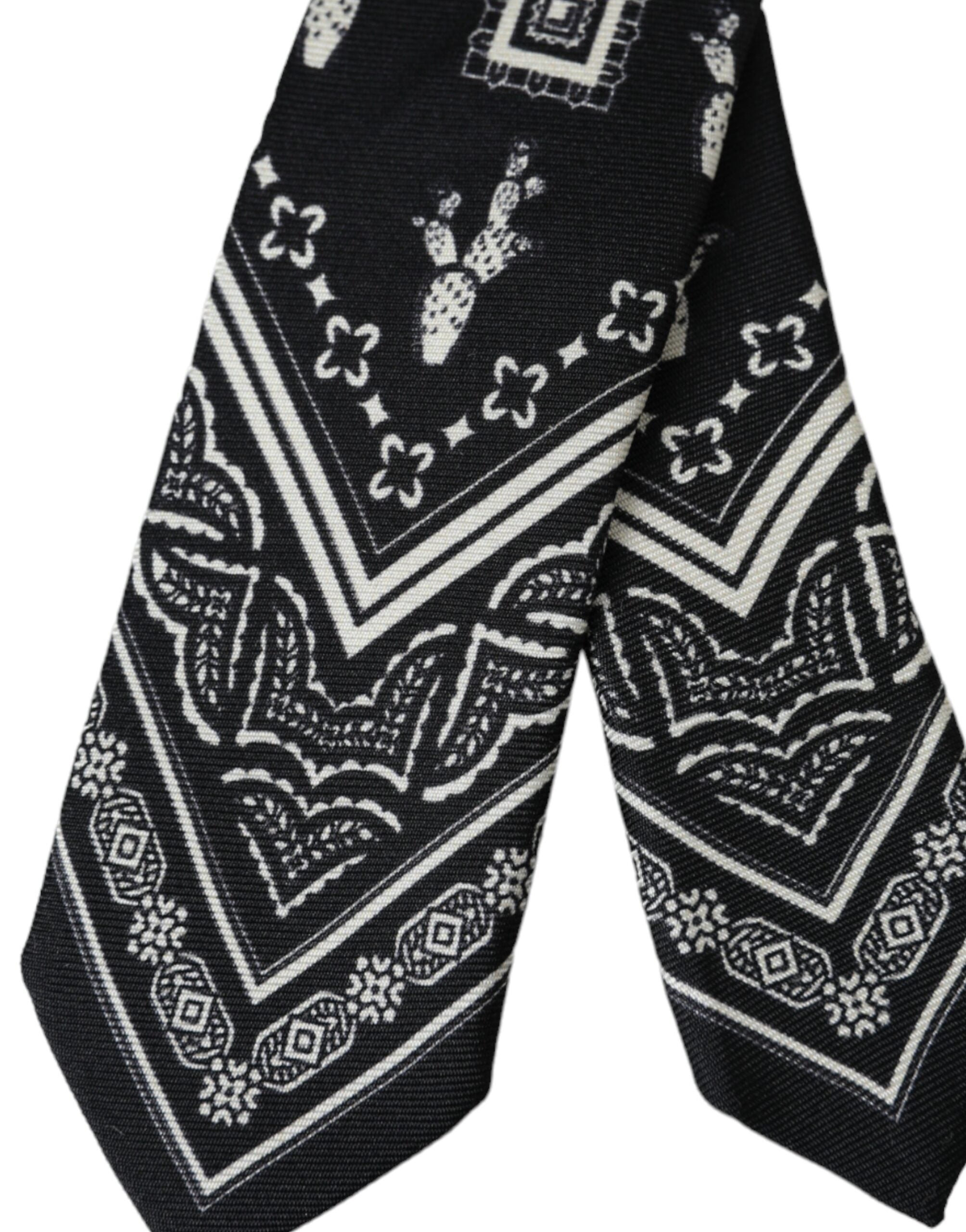 Black patterned 100% silk adjustable tie by Dolce & Gabbana featuring a stylish design and classic knot.