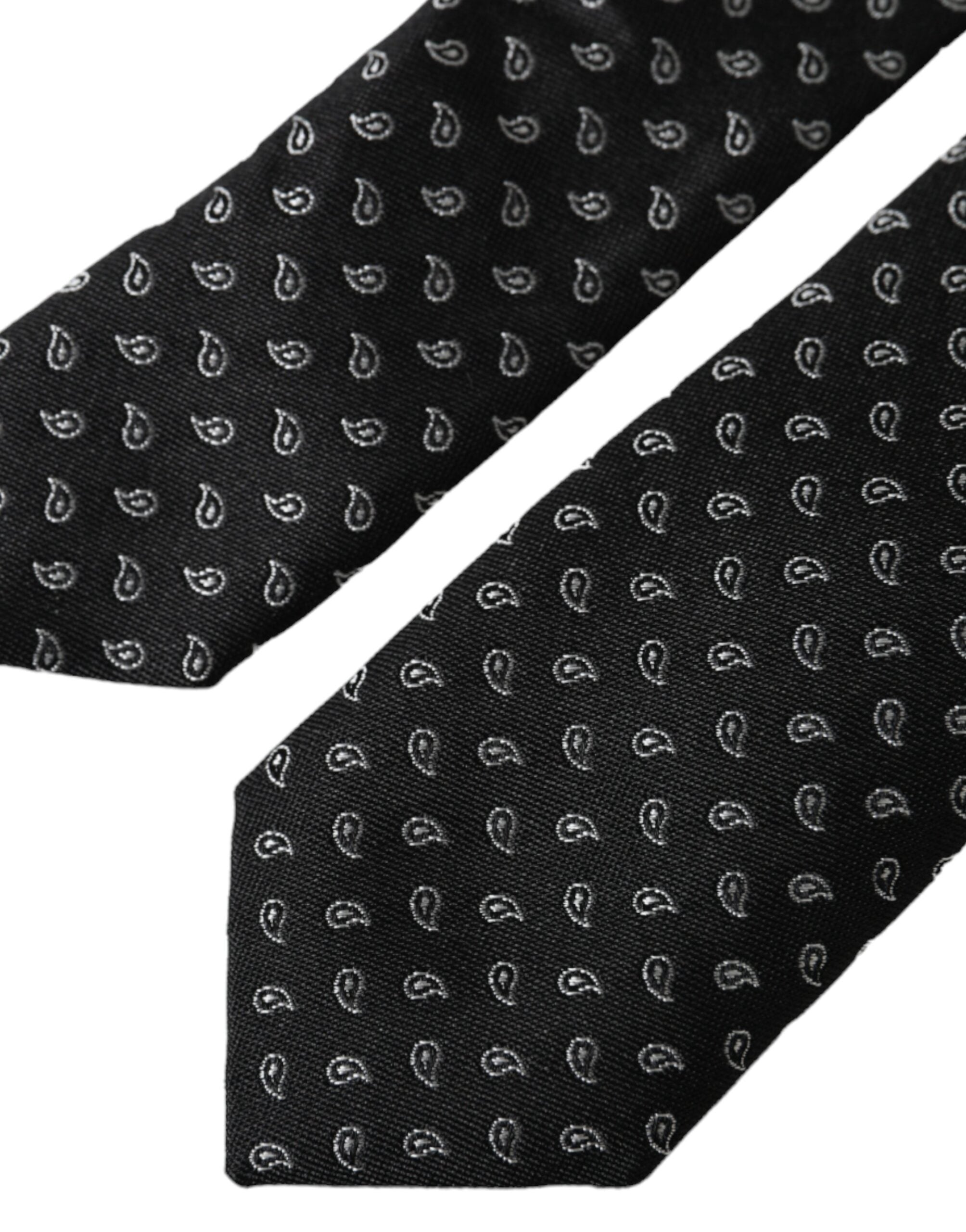 Black jacquard patterned silk men's tie by Dolce & Gabbana, featuring an adjustable design and intricate woven pattern.