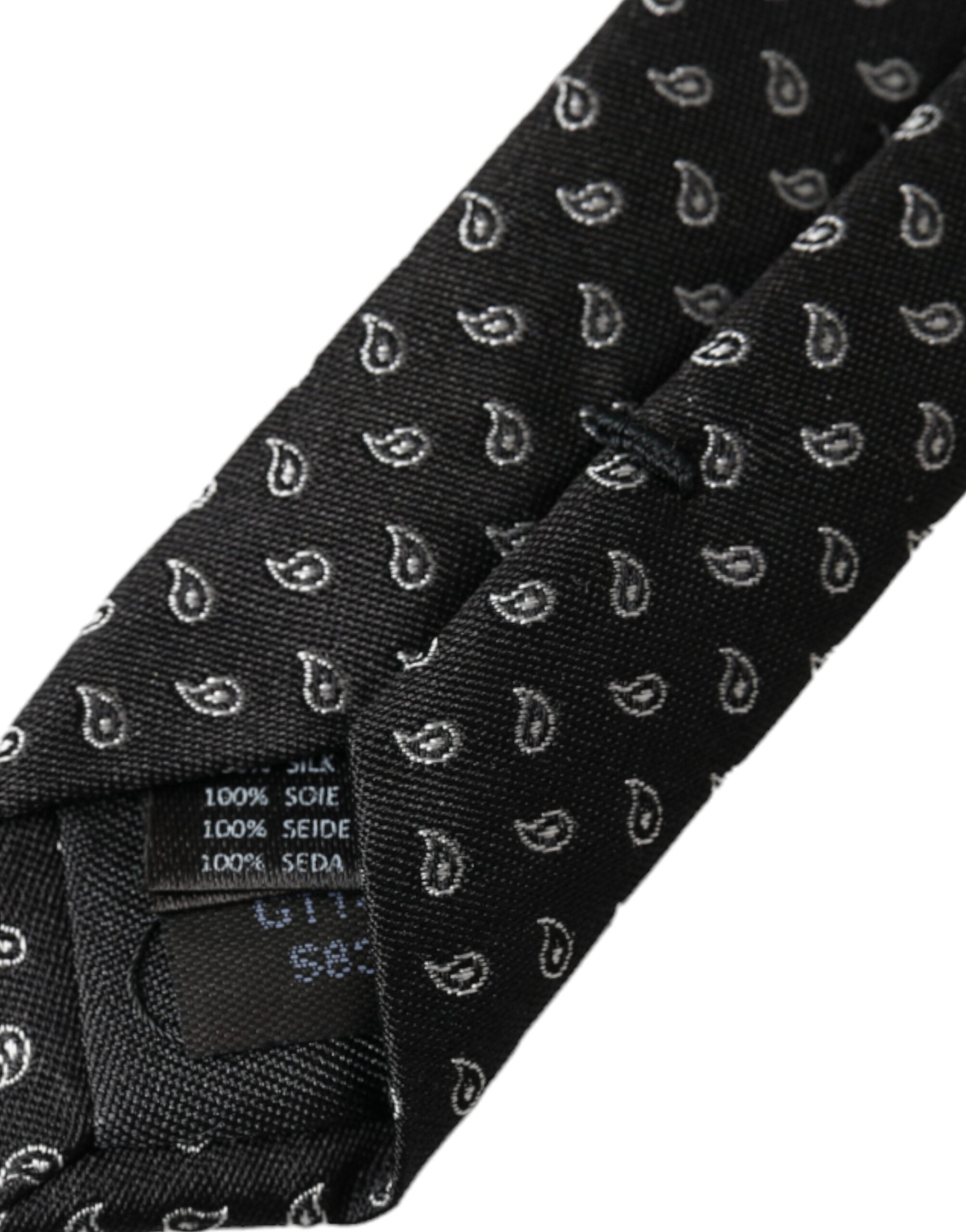 Black Jacquard patterned silk men's tie by Dolce & Gabbana, featuring an adjustable design and intricate woven pattern.