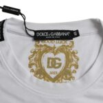 White cotton roundneck short sleeve T-shirt by Dolce & Gabbana, plain design, soft fabric, close-up view showing neckline and fabric texture.