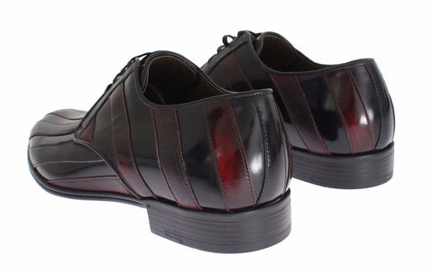 Black Bordeaux leather dress shoes by Dolce & Gabbana, featuring sleek formal design and polished finish.
