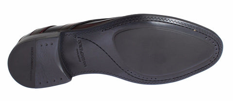 Black Bordeaux leather dress shoes by Dolce & Gabbana, formal men's footwear with sleek design and polished finish.