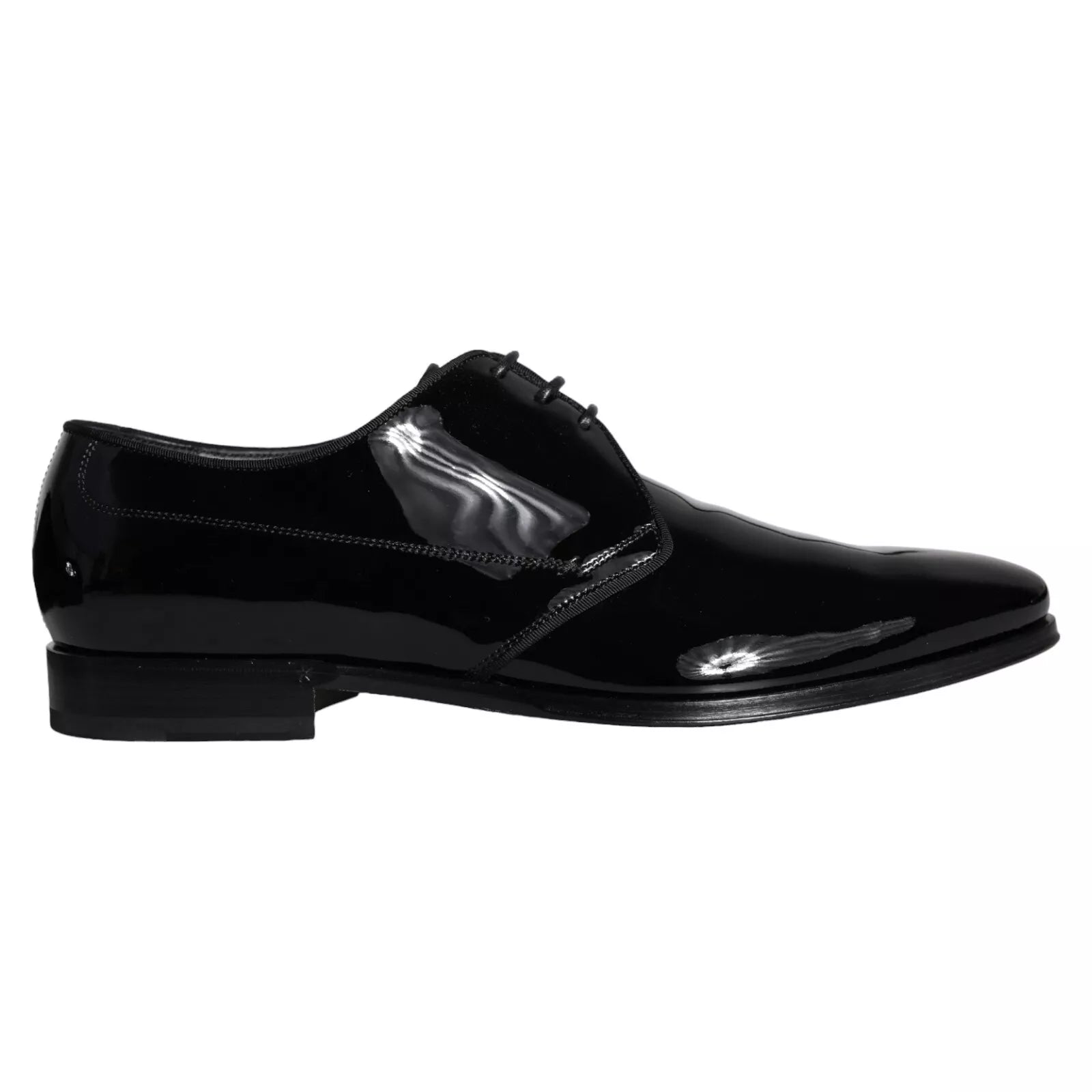 Black calfskin leather Derby men's dress shoes by Dolce & Gabbana, featuring sleek design and polished finish.